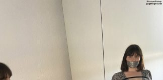 Big Titted Dane Dressed For Bondage Tape gagged woman wearing dress in bondage