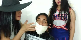 Bound By Witch And Zombie Girl For Halloween Tied up girl gagged with microfoam tape by witch and zombie cheerleader
