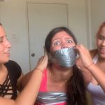 Scared girl gagged with duct tape