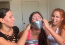 Scared girl gagged with duct tape