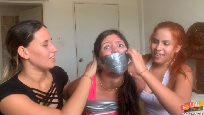 Scared girl gagged with duct tape