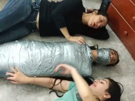 Encased In Multilayered Mummification Bondage Mummified girl gagged tight