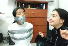 Girl tape gagged tight in duct tape bondage