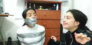 Catsuit Girl Bound To Be Gagged Girl tape gagged tight in duct tape bondage
