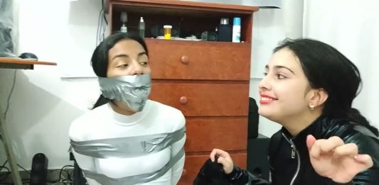 Catsuit Girl Bound To Be Gagged Girl tape gagged tight in duct tape bondage