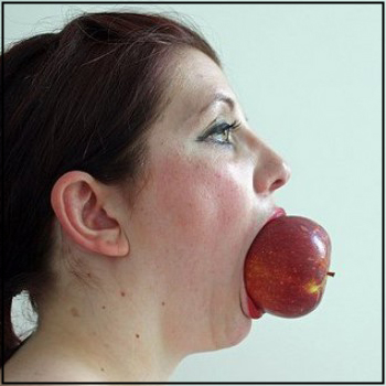 Woman gagged with an apple