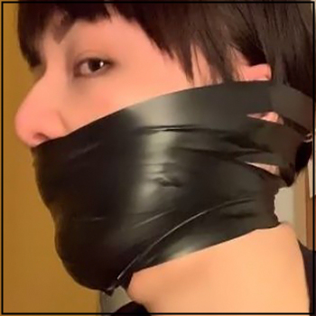Woman tightly gagged with electrical tape
