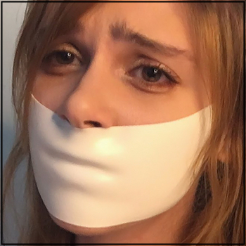 Gagged girl with microfoam medical tape on her mouth