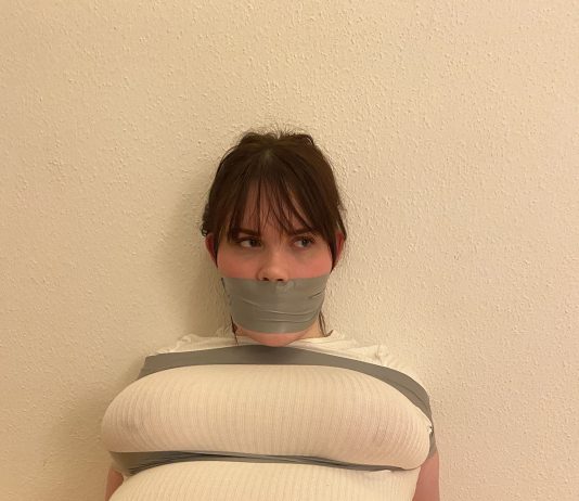 Curvy Dane Trapped And Gagged In Tape Girl with big tits gagged in tape bondage