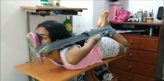 Bound Babysitter Has Stinky Shoe Tied To Her Face Hogtied babysitter in barefoot humiliation bondage