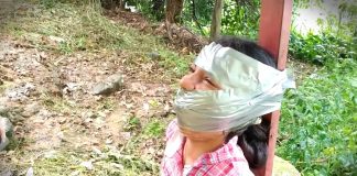 Young Detective Taped To Pole Gagged girl duct taped to pole