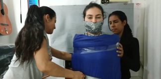 Collared And Pantyhose Hooded In Multilayered Mummification Bondage Gagged girl encased in sleeping bag and duct tape