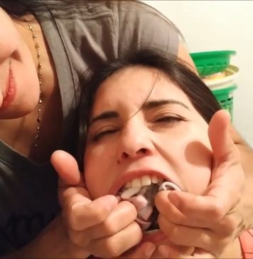 Girl Has 6 Socks Stuffed In Her Mouth Girl has her mouth stuffed with socks by mom