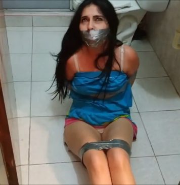 Runaway Girl Caught And Tied By MILF Tape bound girl gagged in bathroom