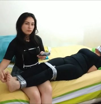 Dominant TV MILF Put In Her Place Tape bound stepmom gagged on bed
