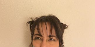 Straitjacketed Cheerleader Tape Gagged Tape gagged brunette in straitjacket bondage