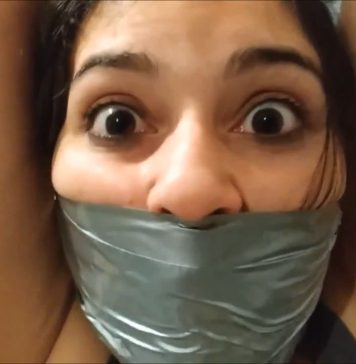 Big Sister Gets Bondage Betrayal Wide eyed girl with duct tape wrapped around her face