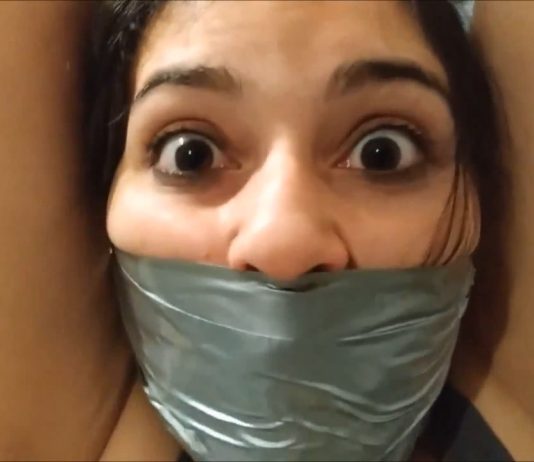 Big Sister Gets Bondage Betrayal Wide eyed girl with duct tape wrapped around her face