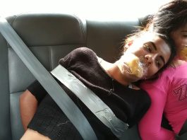 Gagged girls bound and gagged inside car