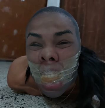 Fashion Model Turned Piggy Girl Pantyhose encased girl hogtied on the floor