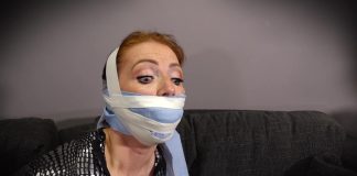 Catsuit Girl Mila In Tape Bondage Catsuit Girl In Tape Bondage - Mila - Gag Attack