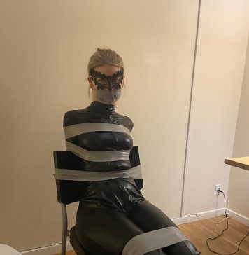 Criminal Catburglar Unmasked In Bondage Blonde catsuit burglar in tape bondage