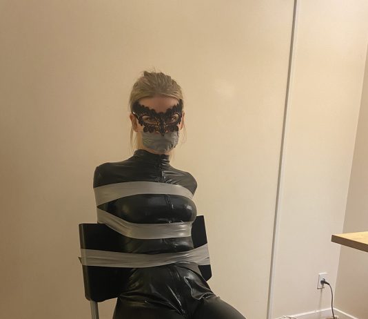 Criminal Catburglar Unmasked In Bondage Blonde catsuit burglar in tape bondage