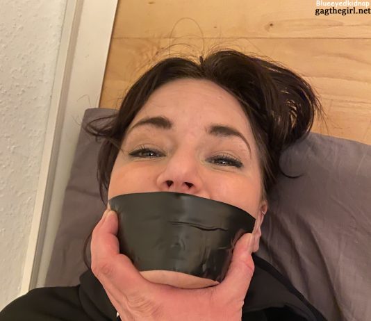 Fitness Babe Bound For Bondage Workout Sexy fitness girl tape bound and gagged in her workout clothes