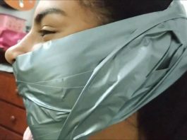 Little Girl Silenced With BIG Tape Gag! A beautiful girl is wearing a big tape gag