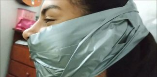 Little Girl Silenced With BIG Tape Gag! A beautiful girl is wearing a big tape gag