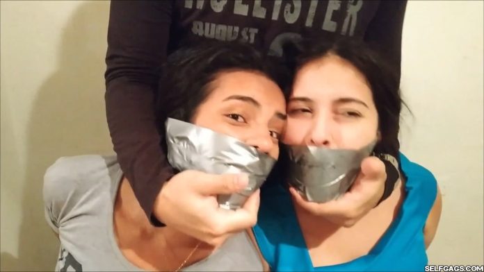 Two bound and gagged damsels in distress