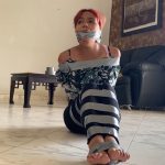 Tape tied girl in barefoot bondage