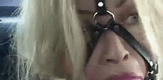 Blonde With Giant Ballgag Harness – Bondage GIF Blonde Captive Wearing Giant Ballgag - bondage gifs