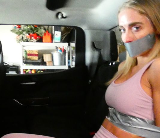 Hot Blondie Jogger In Tape Bondage Blonde girl tape bound and gagged with duct tape