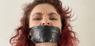 Snooping Catsuit Lady Alexis Luna In Tape Bondage