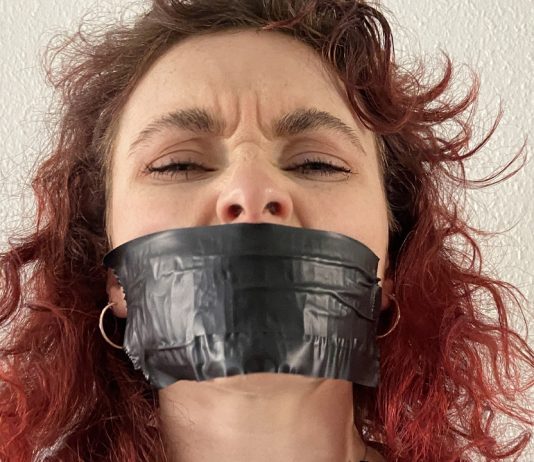Snooping Catsuit Lady Alexis Luna In Tape Bondage