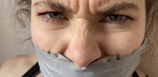 Bound And Gagged On Her Birthday! Mad woman gagged with tape