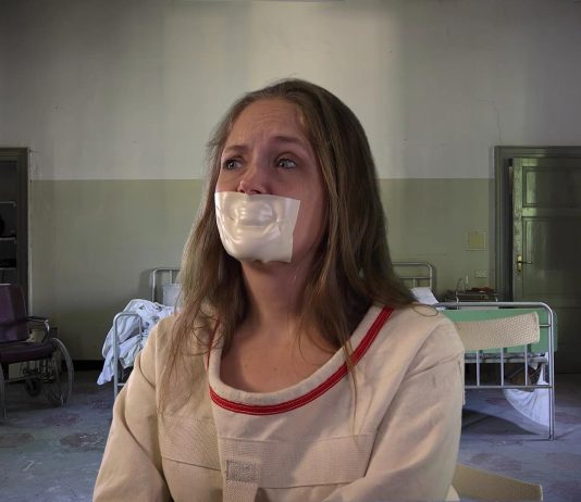 Rachel Adams Tape Gagged In Straitjacket Bondage Rachel Adams Tape Gagged In Straitjacket Bondage