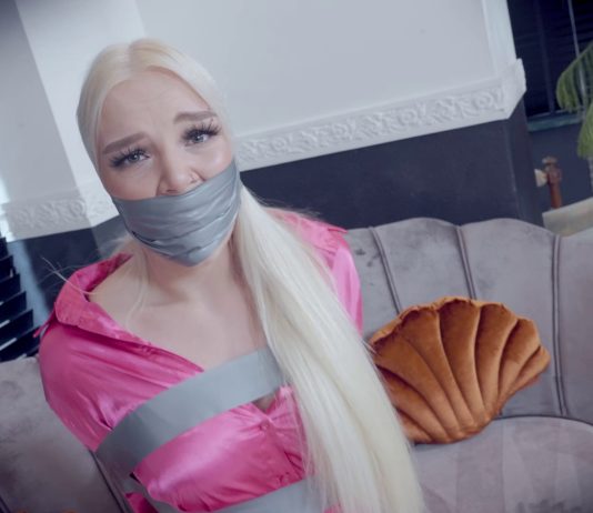 Blonde Luna Tied Up In Heels And Stockings Blonde woman tape wrap gagged in tight tape bondage