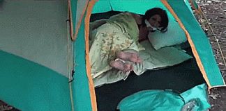 Not A Happy Camper – Bondage GIF Struggling woman bound and gagged in a tent in the woods
