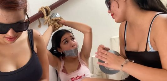 We Have Your Cute-Ass Daughter All Tied Up And Gagged – Selfgags Cute girl gagged with duct tape is tied to the stairs by two women