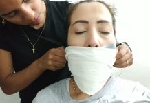 Heavily gagged with duct tape and an otm scarf gag