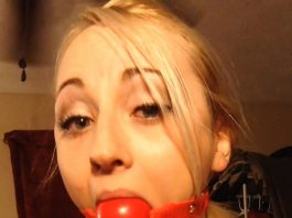 Ball gagged girl drooling and topless