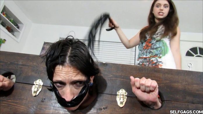 Gagged mom locked up and whipped by evil lezdom daughter