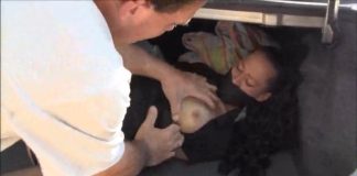 Kidnapped Woman Sold Into Bondage – BDSM Gif A bound and gagged woman in a car trunk has her tits groped by a man