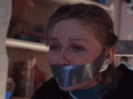 A gif showing actress Kirsten Dunst bound and gagged in the movie Small Soldiers