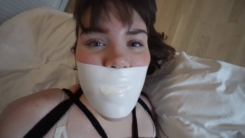Snowflake from Blueeyedkidnap gagged with microfoam tape in rope bondage
