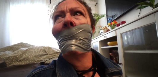 Taylor’s Loudmouth Tape Trap: Gagged Snooper Squirms in Boots & Leather – Blueeyedbondage taylor-loudmouth-tape-trap-blueeyedbondage-featured