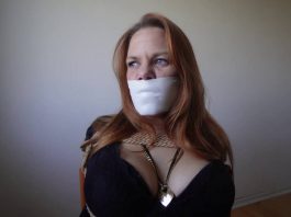 June Chair-Tied and Gagged With Microfoam – Blueeyedbondage Close-up of June’s tightly taped mouth with microfoam gag