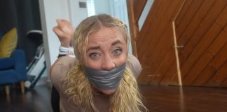 Zoey Ziptie Tightly Gagged and Hogtied by the Plumber – FrenchBondage Zoey’s gagged face in close-up, duct tape pressing over bulging sock gag